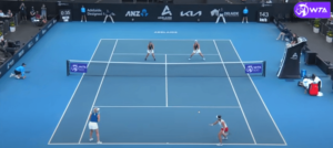Two players at the net showcasing the both up doubles formation